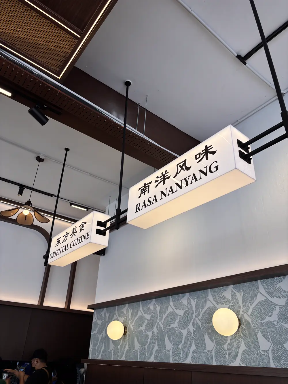 Hanging signs reading Rasa Nanyang inside DOJO Papar